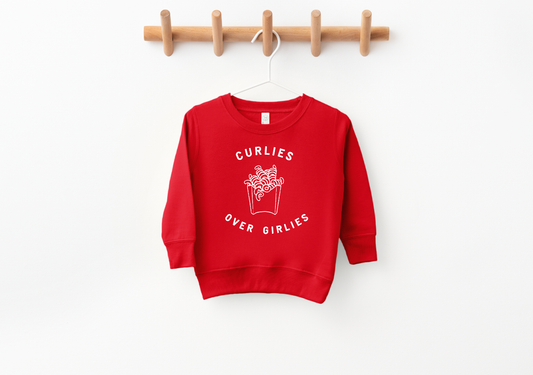 Red sweatshirt with "Curlies Over Girlies" text and curly fries graphic, ideal for casual and fun outfits.